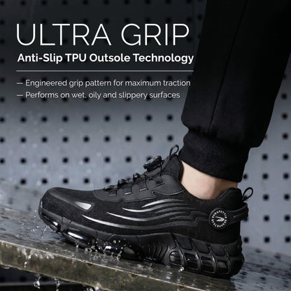strovak flex Black safety shoe with 'Ultra Grip' technology on a wet surface, against a pegboard background.